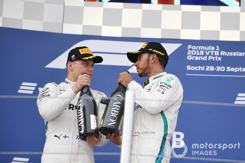 Valtteri Bottas, Mercedes AMG F1 and Lewis Hamilton, Mercedes AMG F1 with the champagne on the podium