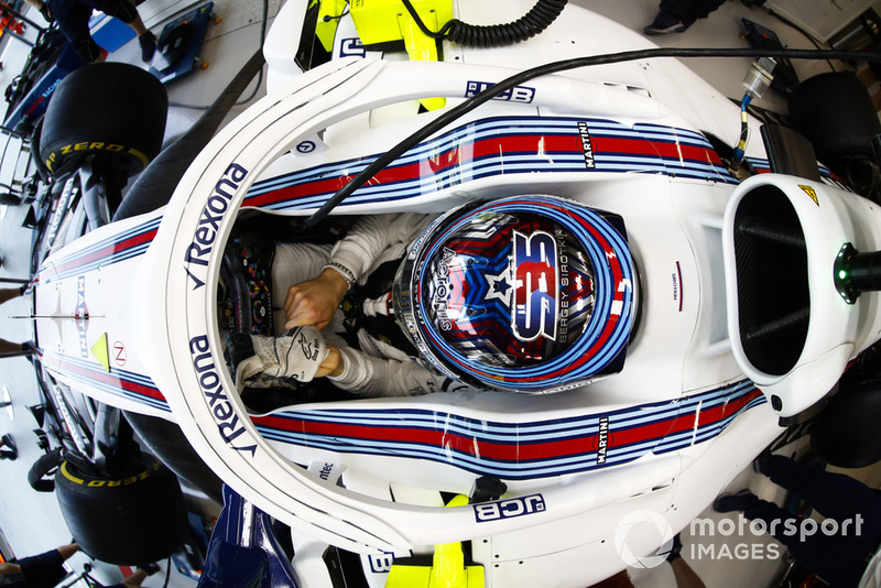 Sergey Sirotkin, Williams Racing, adjusts his gloves in cockpit
