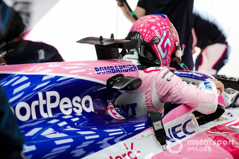 Lance Stroll, Racing Point, enters his cockpit