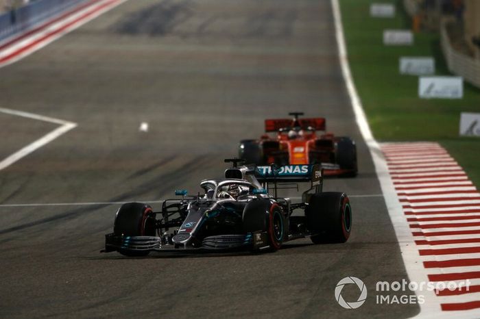 Lewis Hamilton, Mercedes AMG F1 W10, leads Sebastian Vettel, Ferrari SF90