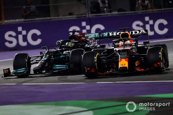 Max Verstappen, Red Bull Racing RB16B, and Lewis Hamilton, Mercedes W12