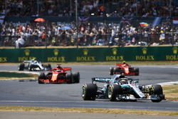 Lewis Hamilton, Mercedes AMG F1 W09, leads Sebastian Vettel, Ferrari SF71H, Kimi Raikkonen, Ferrari SF71H, and Valtteri Bottas, Mercedes AMG F1 W09