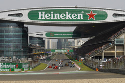 Sebastian Vettel, Ferrari SF71H, leads Kimi Raikkonen, Ferrari SF71H, Valtteri Bottas, Mercedes AMG