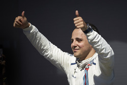 Felipe Massa, Williams, waves to his home fans from the podium after his final home race