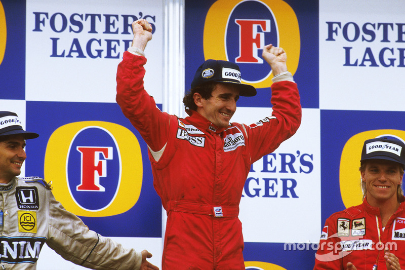 Podium: race winner Alain Prost, McLaren TAG Porsche, second place Nelson Piquet, Williams Honda, th