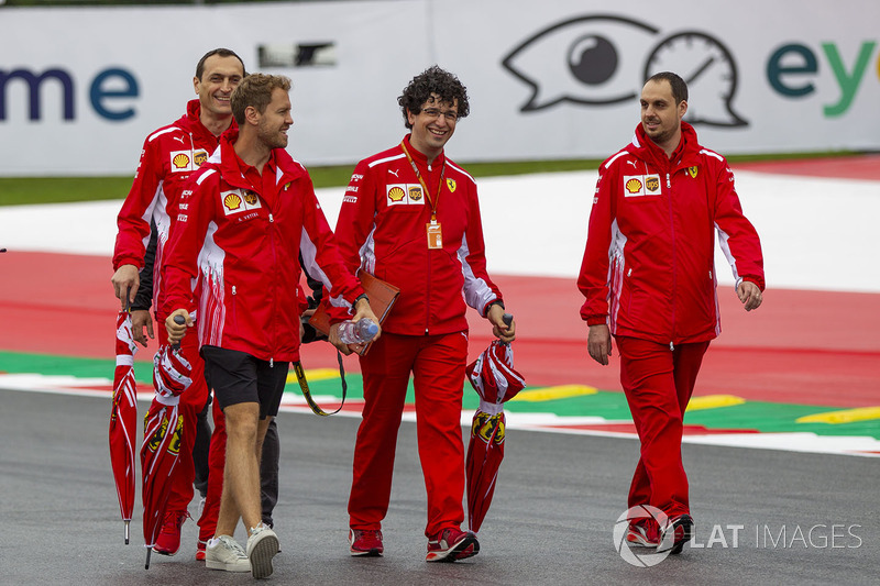 Sebastian Vettel, Ferrari walks the track with the team