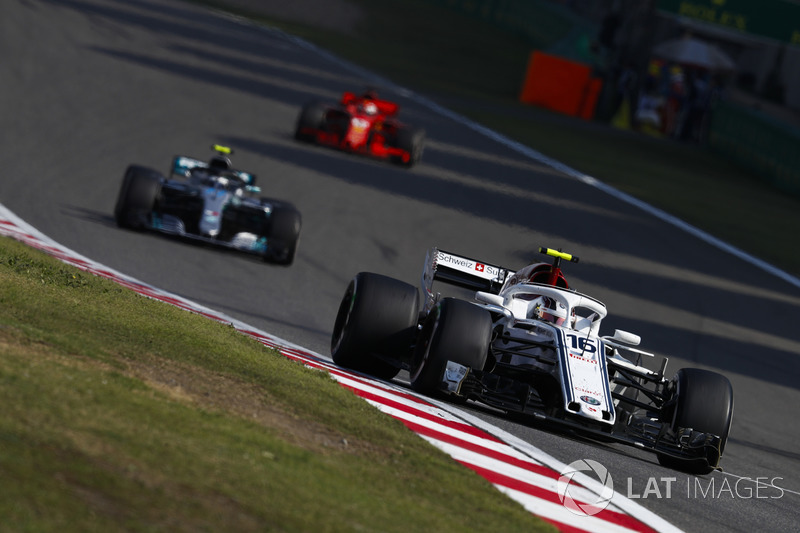 Charles Leclerc, Sauber C37 Ferrari, Valtteri Bottas, Mercedes AMG F1 W09, e Sebastian Vettel, Ferrari SF71H