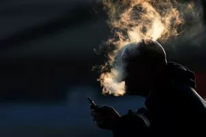Rokende fotograaf