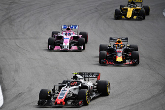 Kevin Magnussen, Haas F1 Team VF-18 leads Daniel Ricciardo, Red Bull Racing RB14 and Sergio Perez, Racing Point Force India VJM11