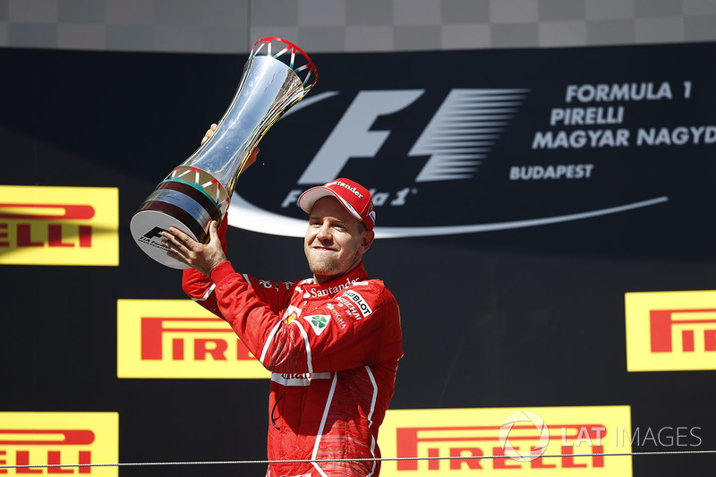 Podium: race winner Sebastian Vettel, Ferrari