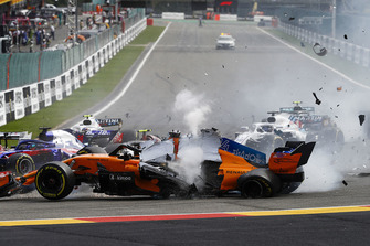Fernando Alonso, McLaren MCL33, crashes over Charles Leclerc, Sauber C37, after contact from Nico Hulkenberg, Renault Sport F1 Team R.S. 18, at the start