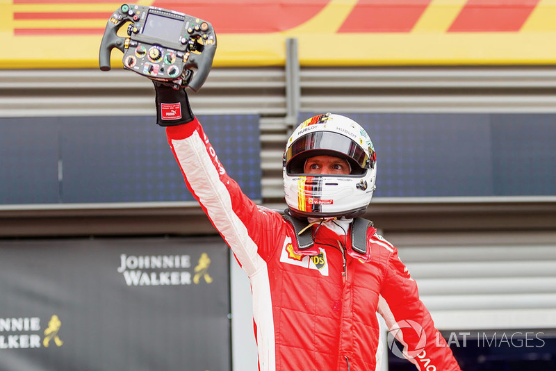 Race winner Sebastian Vettel, Ferrari celebrates in parc ferme with Ferrari SF71H steering wheel