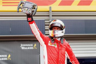 Race winner Sebastian Vettel, Ferrari celebrates in parc ferme with Ferrari SF71H steering wheel