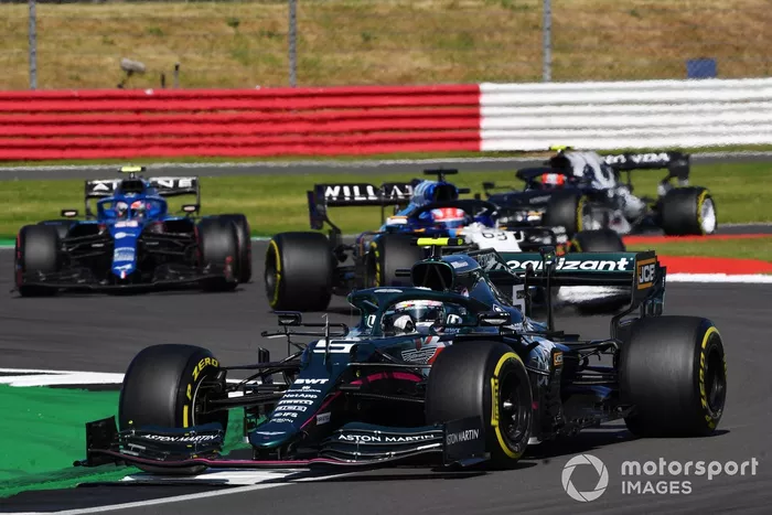 Sebastian Vettel, Aston Martin AMR21, George Russell, Williams FW43B, and Esteban Ocon, Alpine A521