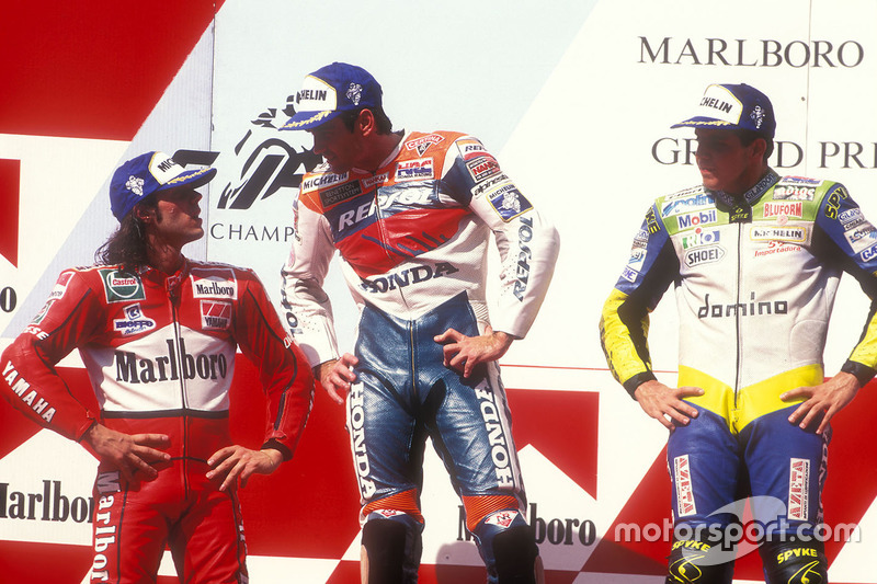 Podium: winner Mick Doohan, Repsol Honda Team, second place Alex Barros, Honda, third place Loris Ca