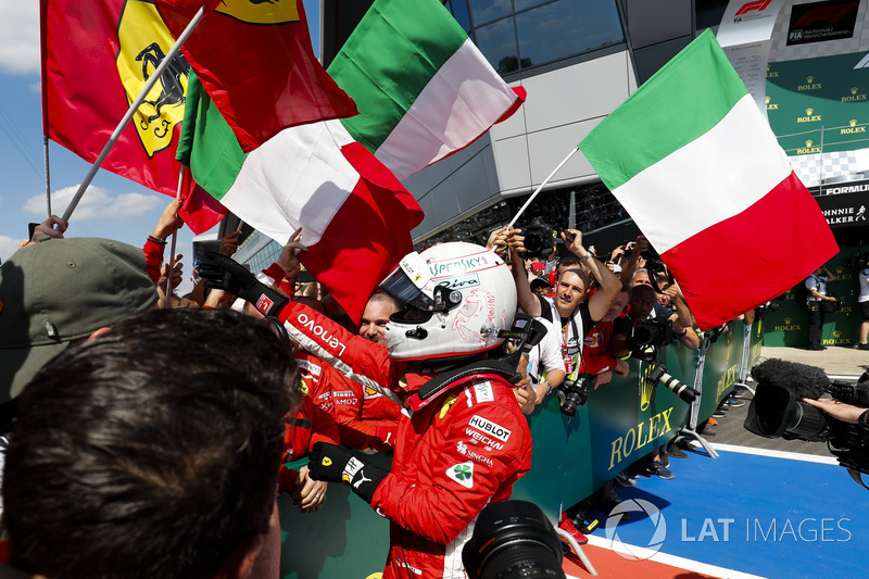 Race winner Sebastian Vettel, Ferrari, celebrates with his team in Parc Ferme