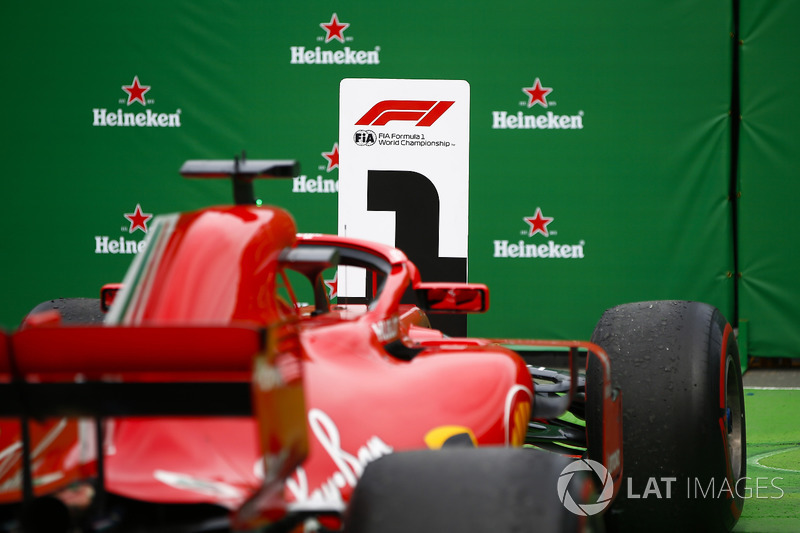 The winning car of Sebastian Vettel, Ferrari SF71H, 1st position, beneath the podium