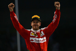 Подіум: Третє місце Себастьян Феттель, Ferrari