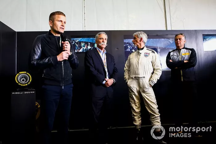 Chase Carey, Damon Hill y Mario Isola, Pirelli Motorsport