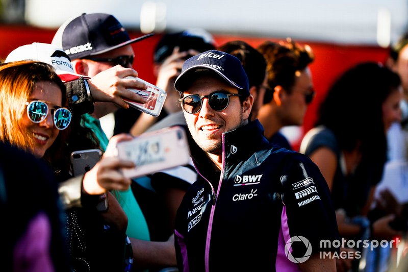 Sergio Perez, Racing Point poses for a seflie with a fan