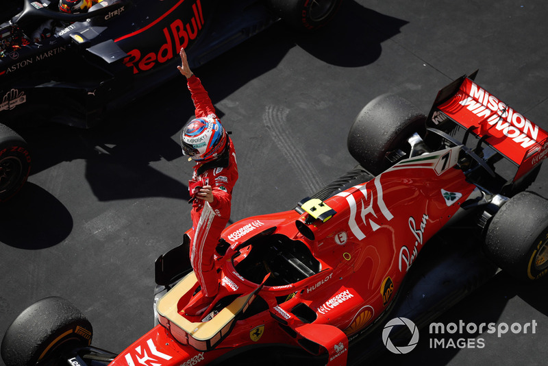 Kimi Raikkonen, Ferrari SF71H, celebrates in Parc Ferme after winning the race.