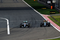 Lewis Hamilton, Mercedes AMG F1 Team W07 and Nico Hulkenberg, Sahara Force India F1 VJM09 battle for