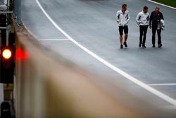 Romain Grosjean, Haas F1 Team, conducts a track walk with colleagues