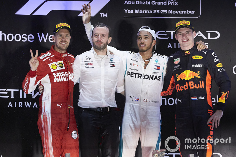 Sebastian Vettel, Ferrari, 2nd position, Bradley Lord, Communications Director, Mercedes AMG, Lewis Hamilton, Mercedes AMG F1, 1st position, and Max Verstappen, Red Bull Racing, 3rd position, on the podium