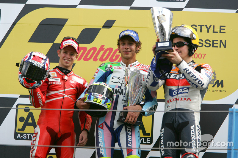 Podium: second place Cases Stoner, Ducati; Winner Valentino Rossi, Yamaha; third place Nicky Hayden,