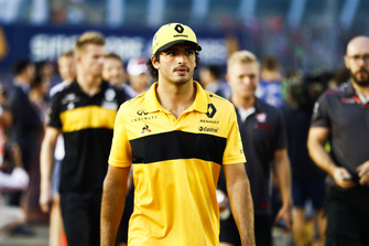 Carlos Sainz Jr., Renault Sport F1 Team, walks ahead of Nico Hulkenberg, Renault Sport F1 Team, and Kevin Magnussen, Haas F1 Team