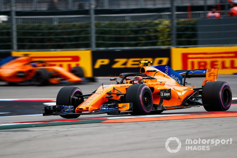 Stoffel Vandoorne, McLaren MCL33, leads Fernando Alonso, McLaren MCL33