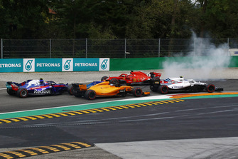 Sebastian Vettel, Ferrari SF71H spins after contact with Lewis Hamilton, Mercedes AMG F1 W09 on lap one as Max Verstappen, Red Bull Racing RB14 passes
