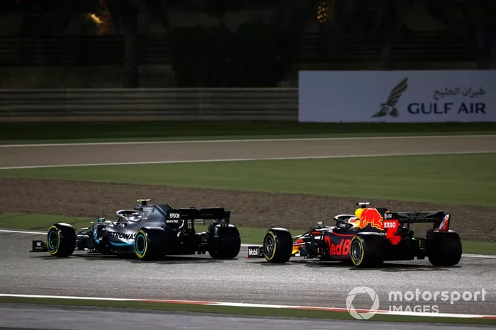 Valtteri Bottas, Mercedes AMG W10, leads Max Verstappen, Red Bull Racing RB15