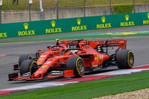 Sebastian Vettel, Ferrari SF90, leads Charles Leclerc, Ferrari SF90