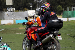 Race retiree Brendon Hartley, Scuderia Toro Rosso gets a ride with a Marshal on a motorbike after retiring with engine failure