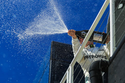 Second place Valtteri Bottas, Mercedes AMG F1 celebrates on the podium with the champagne