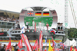 The podium (L to R): Lewis Hamilton, Mercedes AMG F1, second; Nico Rosberg, Mercedes AMG F1, race wi