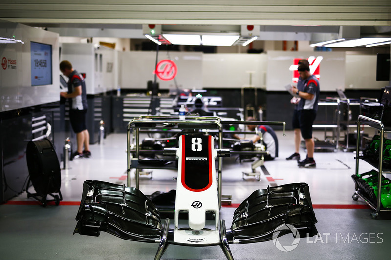The car of Romain Grosjean, Haas F1 Team VF-17, being prepared in the garage