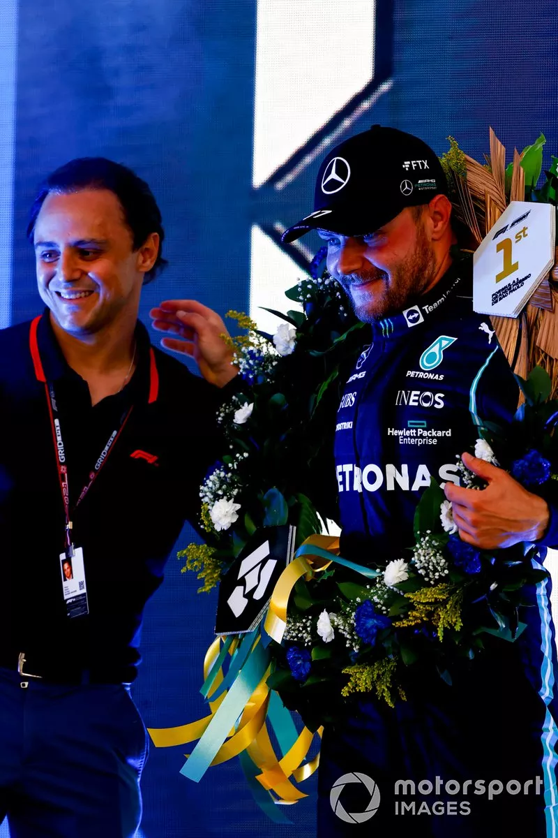 Felipe Massa sul podio con Valtteri Bottas, Mercedes