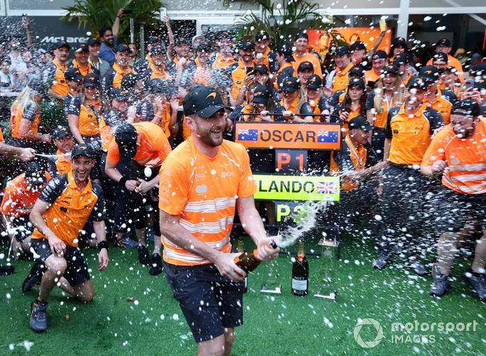 The McLaren team celebrate victory 