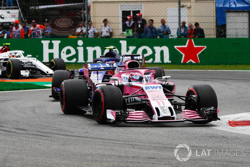 Sergio Perez, Racing Point Force India VJM11, leads Pierre Gasly, Toro Rosso STR13, and Charles Leclerc, Sauber C37