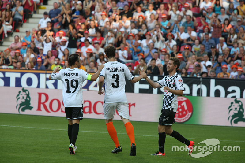 Felipe Massa, Williams, Arne Friedrich, former football player and Sebastian Vettel, Ferrari