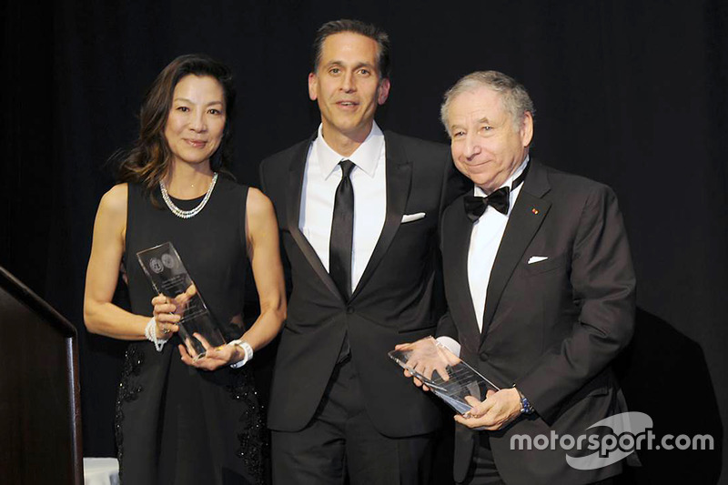 FIA President Jean Todt and his wife Michelle Yeoh accept the Humanitarian of the Year Award from the United Nations Association of New York