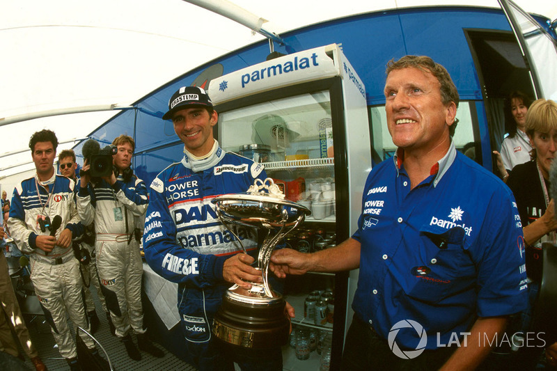 Second place Damon Hill, Arrows with his trophy and Tom Walkinshaw