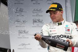 Valtteri Bottas, Mercedes AMG F1, 2nd position, sprays Champagne on the podium