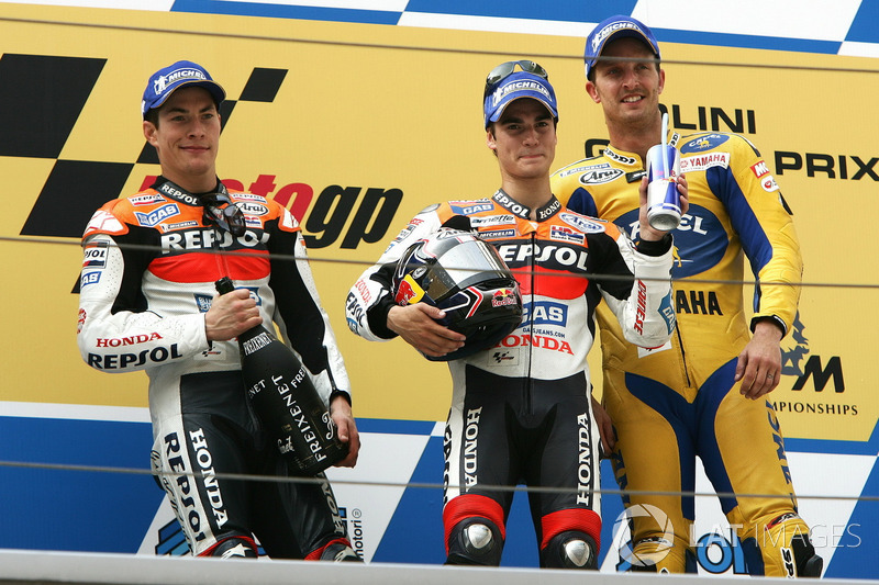 Podium: second place Nicky Hayden, Repsol Honda Team, Race winner Dani Pedrosa, Repsol Honda Team, third place Colin Edwards