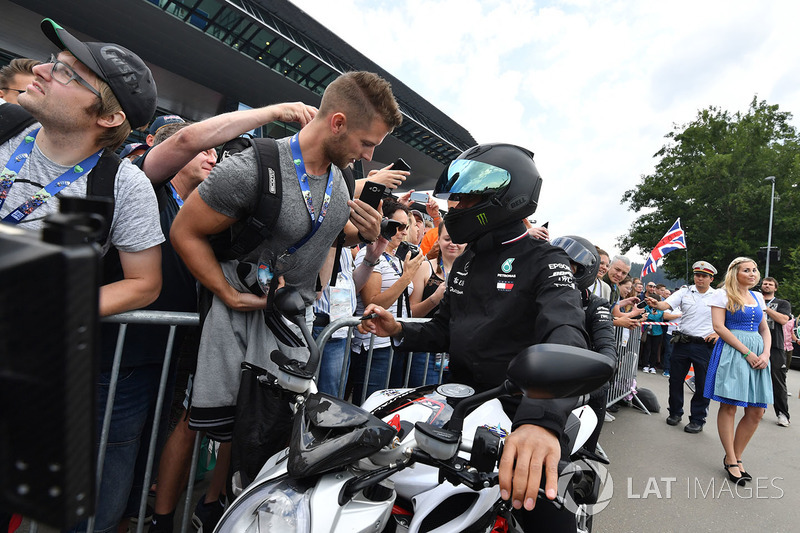 Lewis Hamilton, Mercedes-AMG F1 on his MV Agusta motorbike and fans