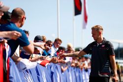 Kevin Magnussen, Haas F1 Team, signs autographs for fans