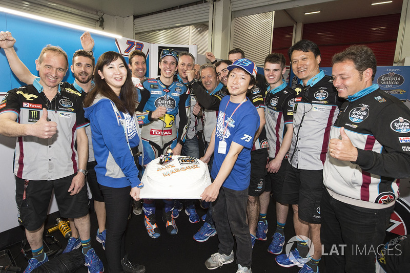 Alex Marquez presented with a cake to celebrate 100 GP starts