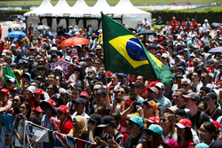 Fans take in the events on the F1 stage